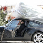 Keanu Reeves Turns LA Into a Christmas Movie: Spotted Hauling a Tree on His Iconic Porsche 993 C4 🎄🔥