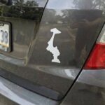 The Reason Some Drivers Put This Sticker Upside Down on Their Cars